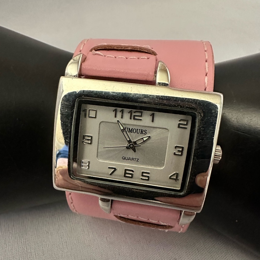 Rumours silver tone watch on a wide pink leather band